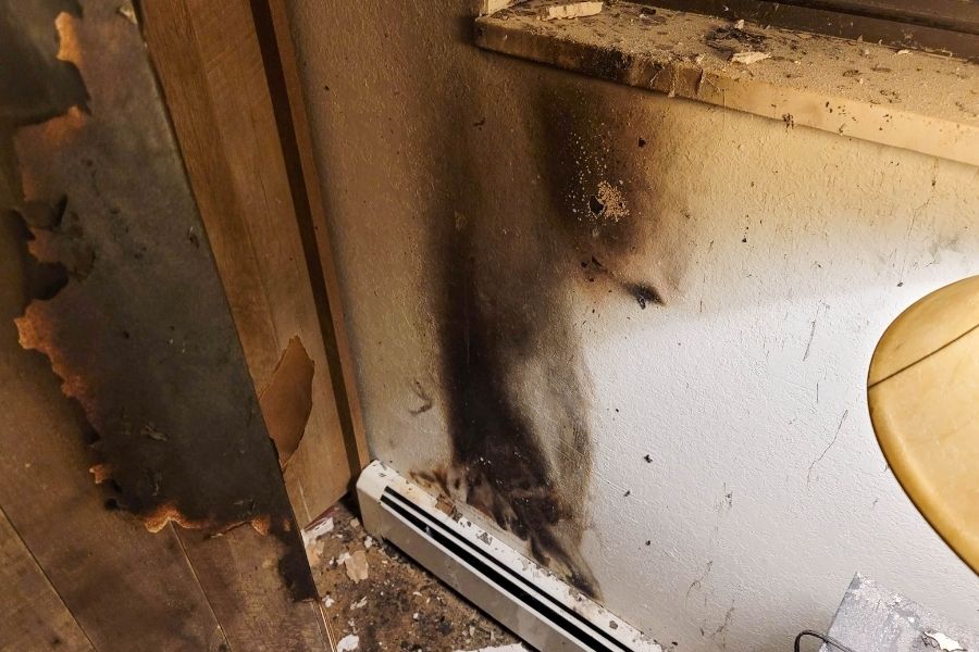fire-damaged wall