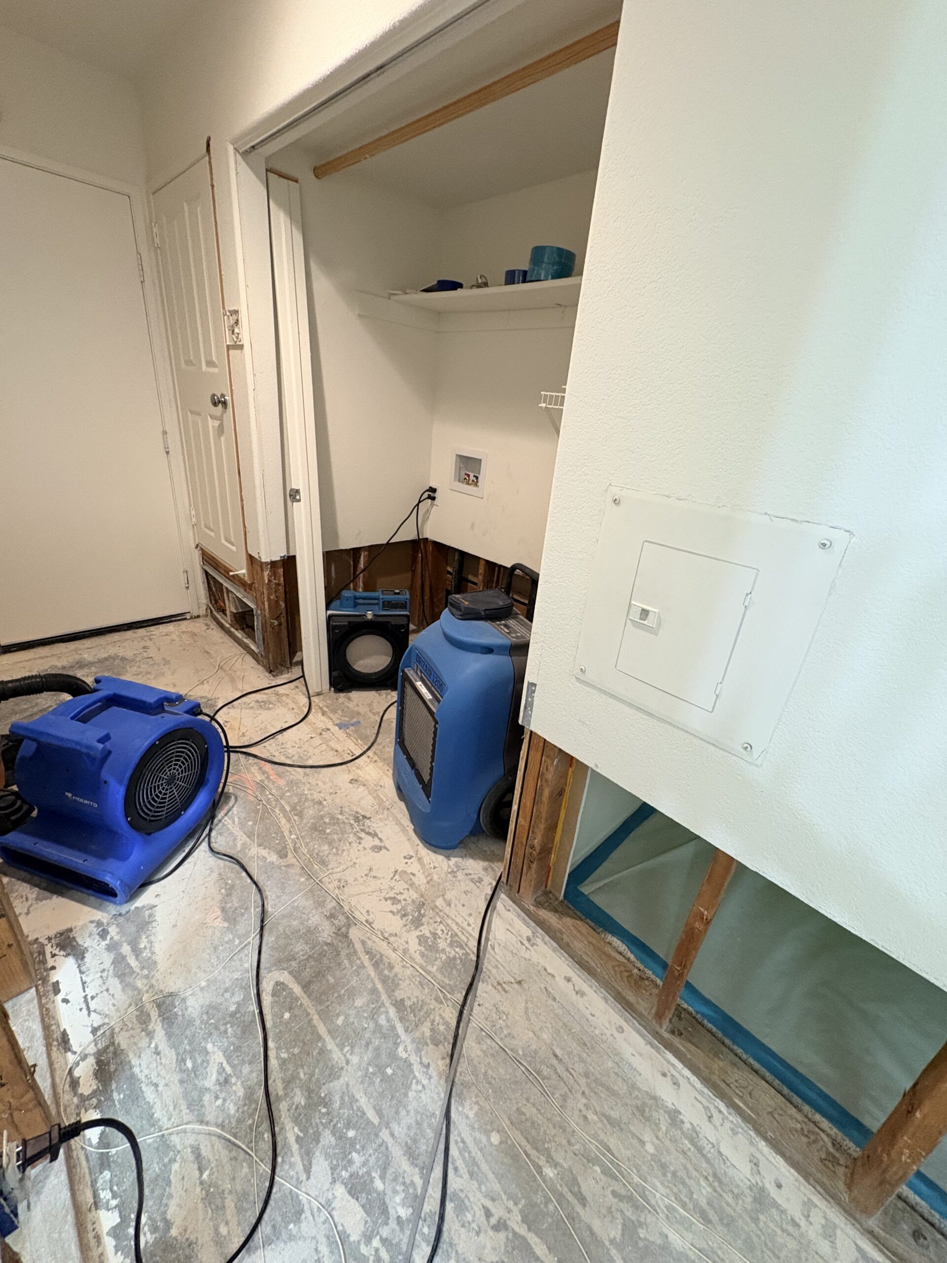 Professional drying equipment placed inside closet during water damage restoration at Anaheim property